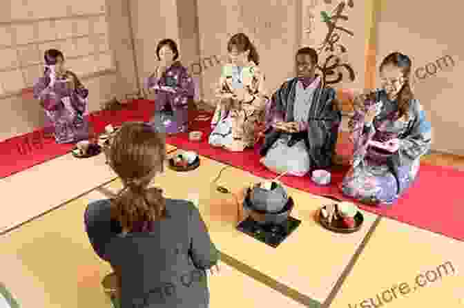 Japanese Tea Ceremony With People Kneeling Around A Tea Table The Abundance Of Less: Lessons In Simple Living From Rural Japan