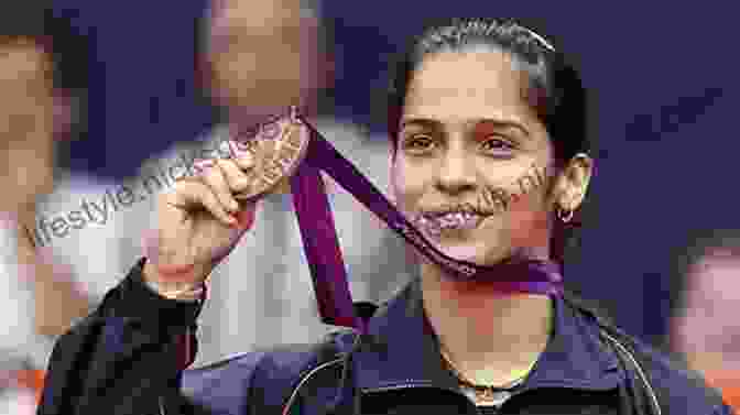 Saina Nehwal, The Indian Badminton Legend, Celebrating A Victory With Her Signature Pose. Winning Like Saina: Think Succeed Like Nehwal